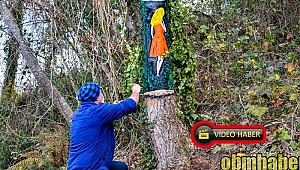 Ağaç üzerine çizdiği 3 boyutlu resimler dikkat çekiyor